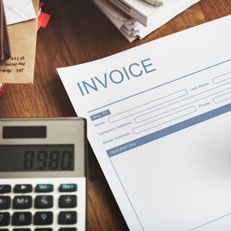 Small business owner reviewing monthly bookkeeping reports