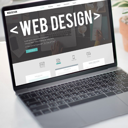 Modern website layout preview on laptop and phone